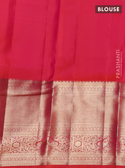 Pure kanchipuram silk saree dual shade of pinkish orange with allover zari woven brocade weaves and long zari woven border