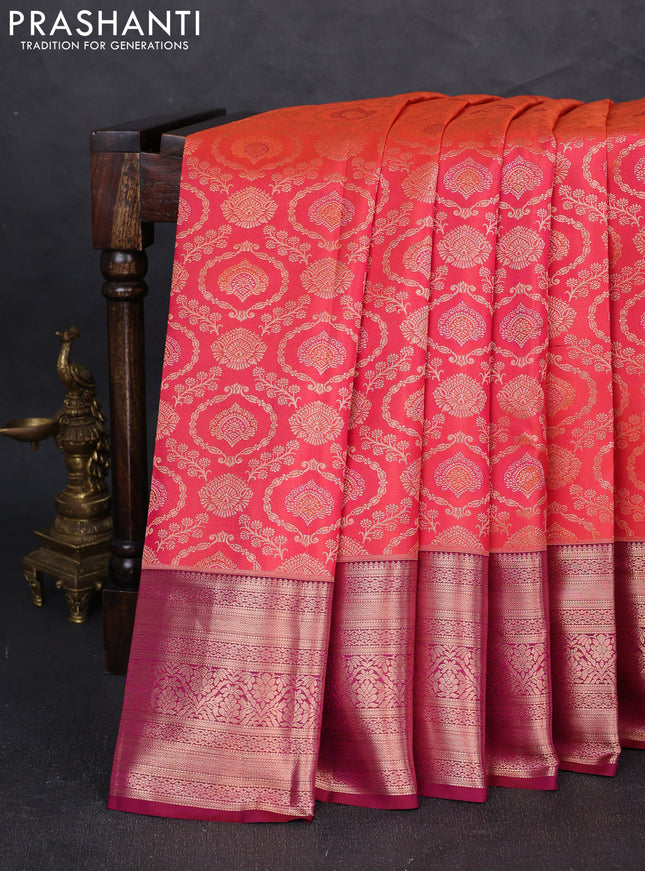 Pure kanchipuram silk saree dual shade pinkish orange and wine shade with allover zari woven brocade weaves and long zari woven border