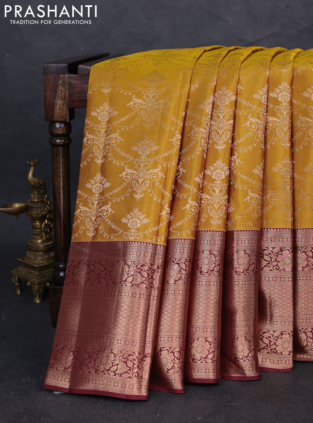 Pure kanchipuram silk saree mustard green and deep maroon with allover zari woven brocade weaves and long zari woven border