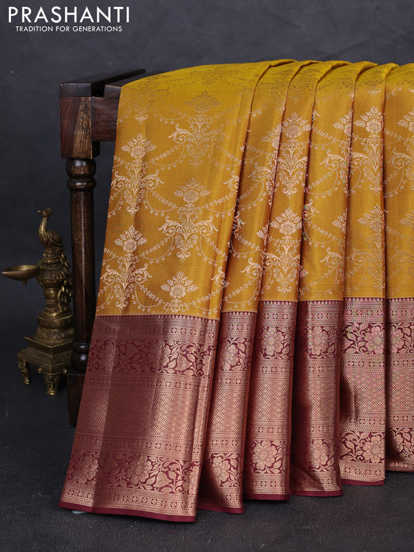 Pure kanchipuram silk saree mustard green and deep maroon with allover zari woven brocade weaves and long zari woven border