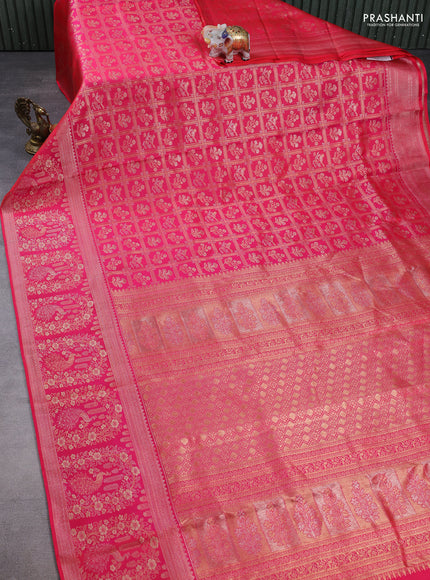 Pure kanchipuram silk saree dual shade of pink with allover zari woven brocade weaves and long zari woven border