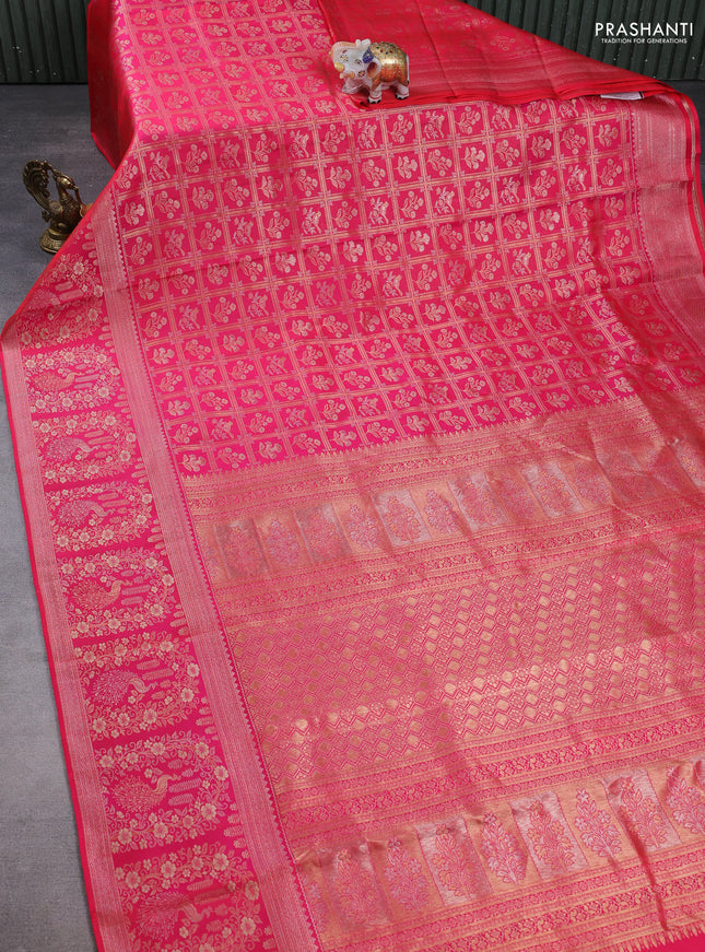 Pure kanchipuram silk saree dual shade of pink with allover zari woven brocade weaves and long zari woven border