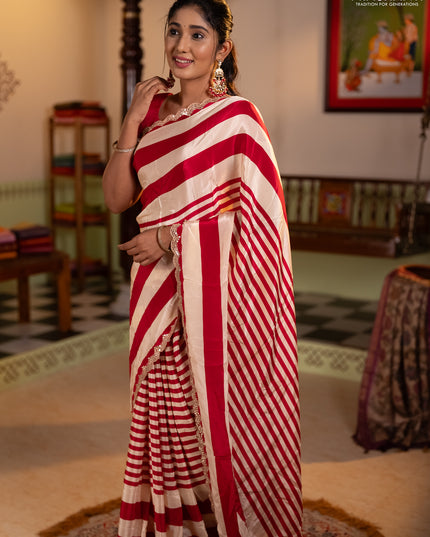 Crepe silk saree cream and pink with allover stripe pattern and mirror embroidery pallu