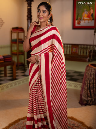Crepe silk saree cream and pink with allover stripe pattern and mirror embroidery pallu