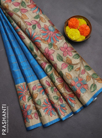 Semi tussar saree cs blue and beige with allover zari checked pattern and kalamkari printed pallu