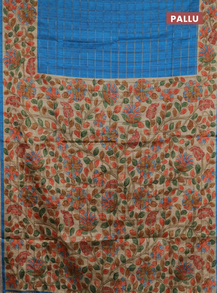 Semi tussar saree cs blue and beige with allover zari checked pattern and kalamkari printed pallu