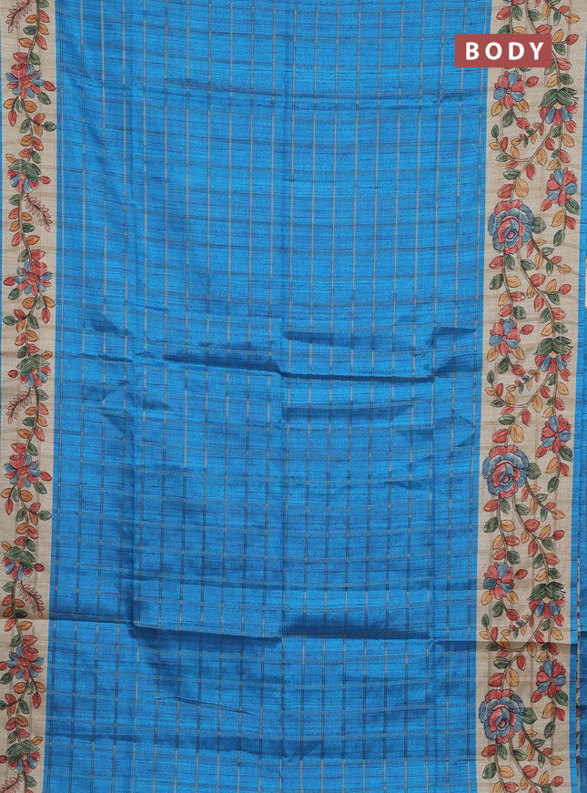 Semi tussar saree cs blue and beige with allover zari checked pattern and kalamkari printed pallu