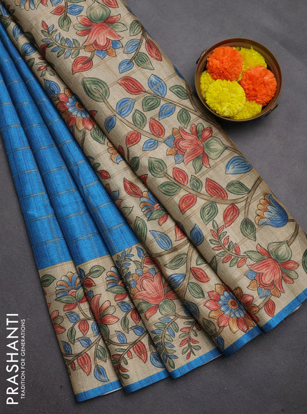 Semi tussar saree cs blue and beige with allover zari checked pattern and kalamkari printed pallu