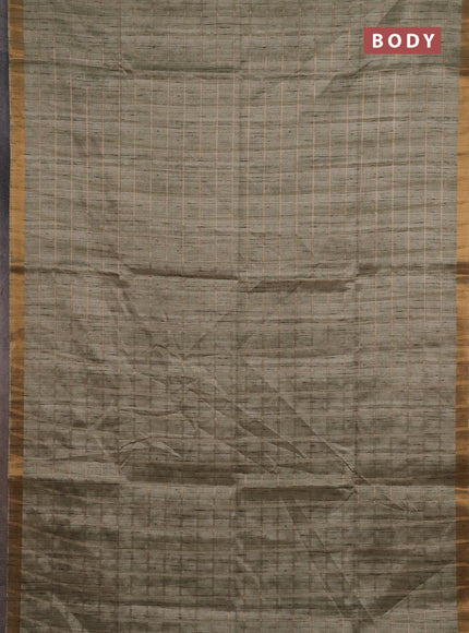 Semi tussar saree pastel green and beige with allover zari checked pattern and kalamkari printed pallu