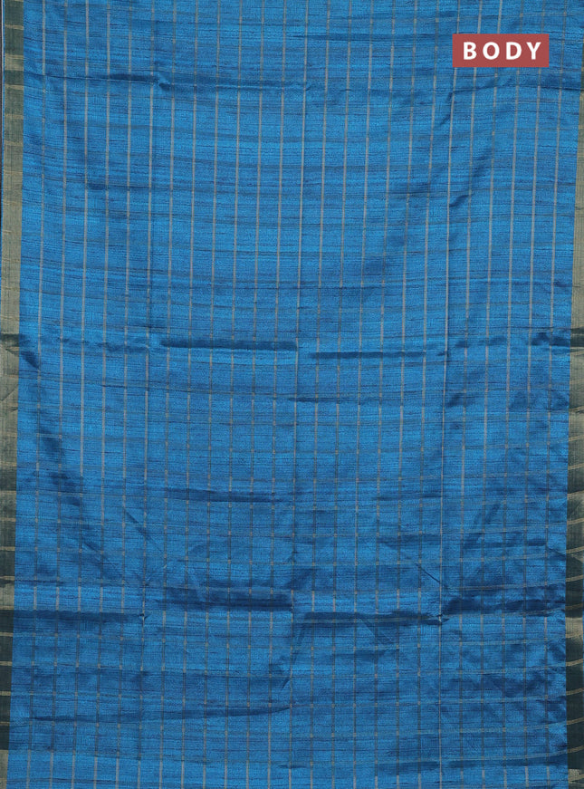Semi tussar saree cs blue and beige with allover zari checked pattern and kalamkari printed pallu
