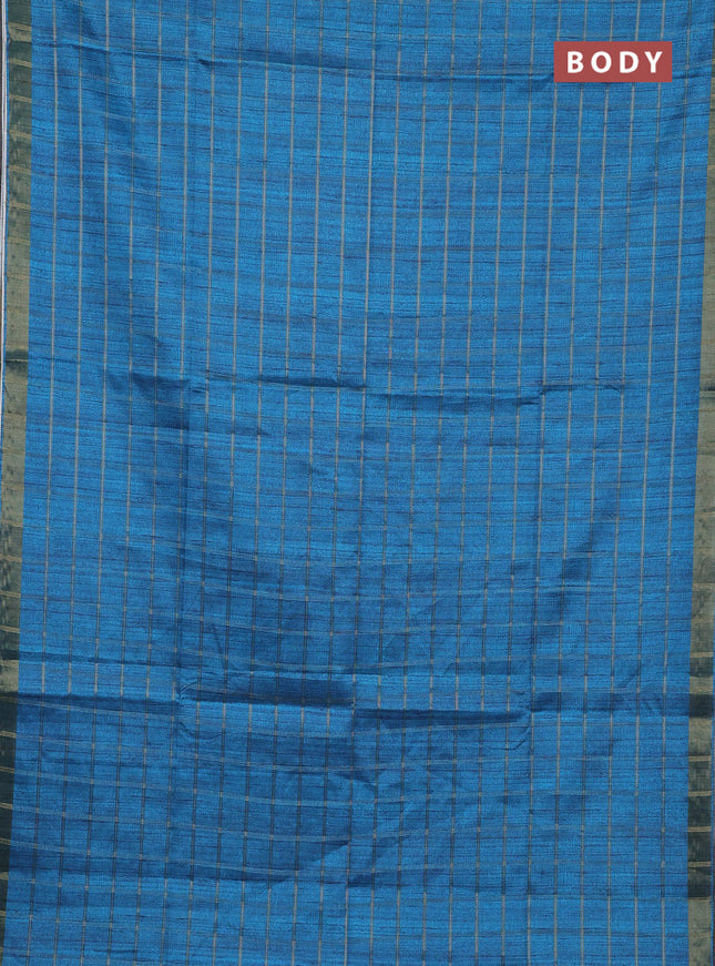 Semi tussar saree cs blue and beige with allover zari checked pattern and kalamkari printed pallu