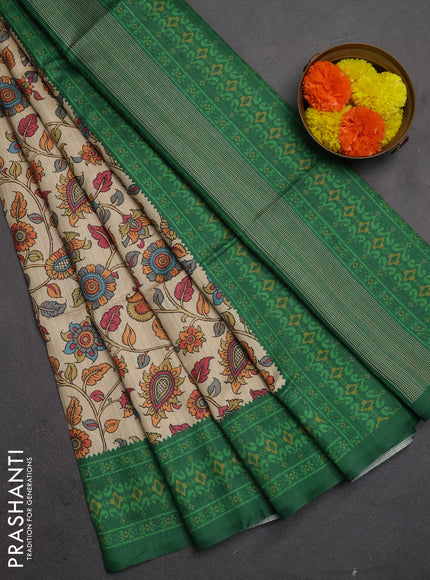 Semi tussar saree beige and green with allover kalamkari prints and patola printed border