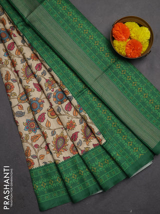 Semi tussar saree beige and green with allover kalamkari prints and patola printed border