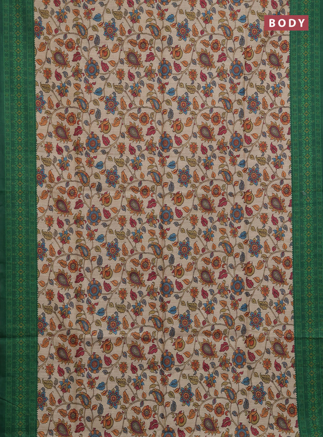 Semi tussar saree beige and green with allover kalamkari prints and patola printed border
