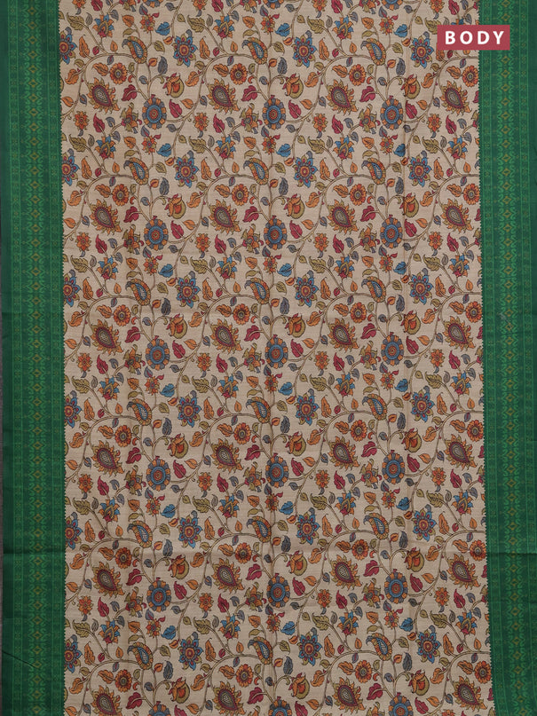 Semi tussar saree beige and green with allover kalamkari prints and patola printed border