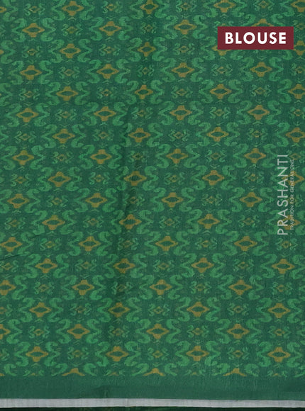 Semi tussar saree beige and green with allover kalamkari prints and patola printed border