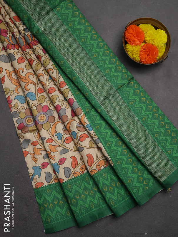 Semi tussar saree beige and green with allover kalamkari prints and patola printed border