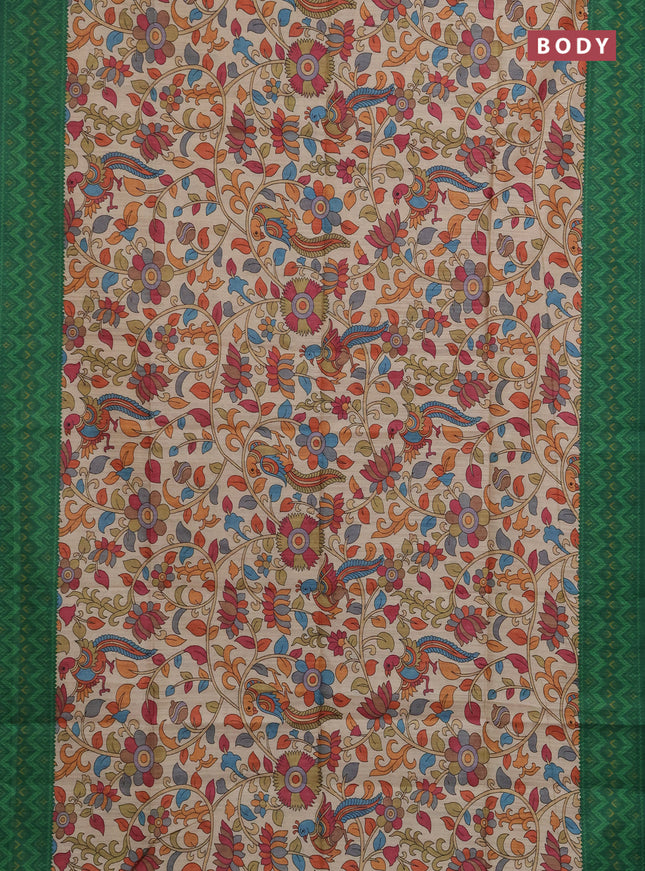 Semi tussar saree beige and green with allover kalamkari prints and patola printed border