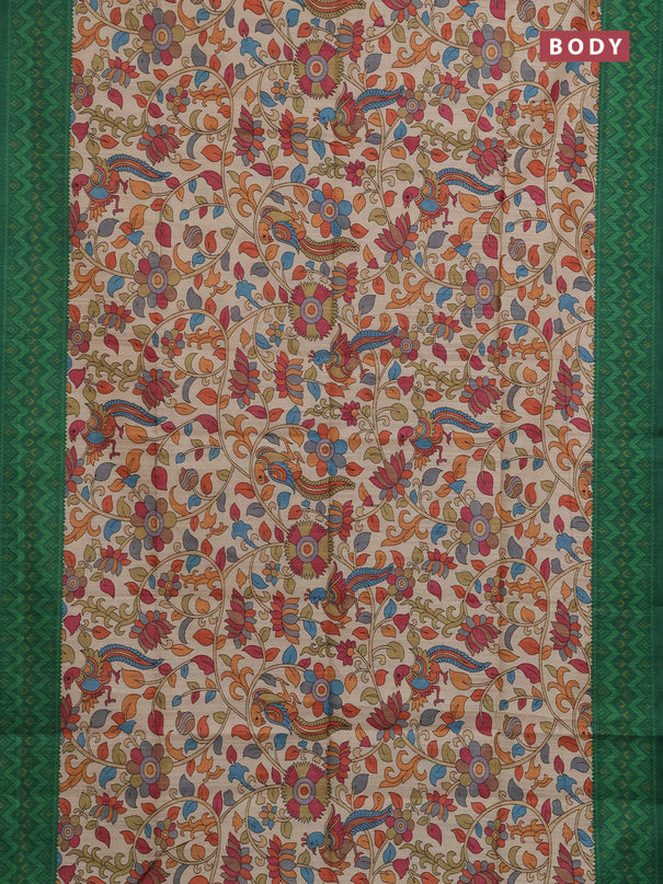Semi tussar saree beige and green with allover kalamkari prints and patola printed border