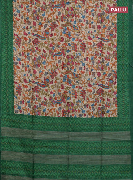 Semi tussar saree beige and green with allover kalamkari prints and patola printed border