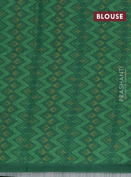 Semi tussar saree beige and green with allover kalamkari prints and patola printed border