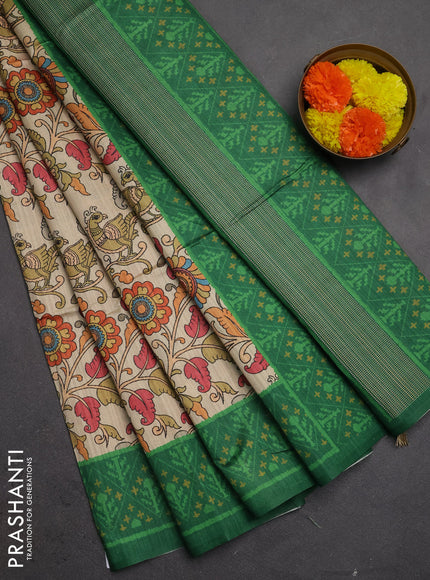Semi tussar saree beige and green with allover kalamkari prints and patola printed border