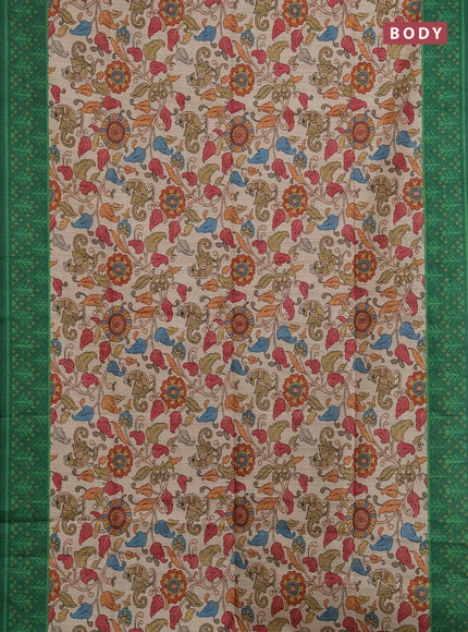 Semi tussar saree beige and green with allover kalamkari prints and patola printed border