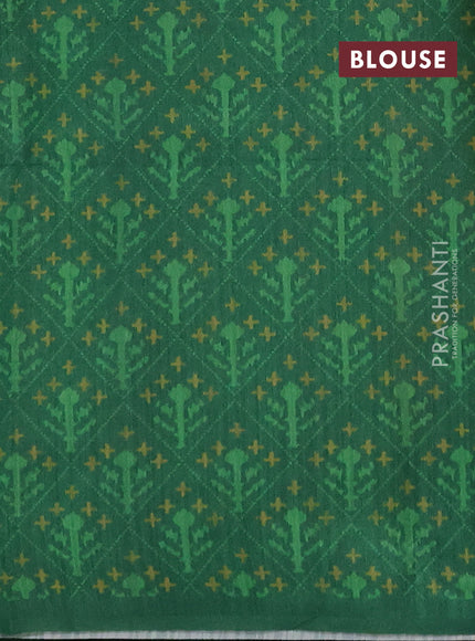Semi tussar saree beige and green with allover kalamkari prints and patola printed border