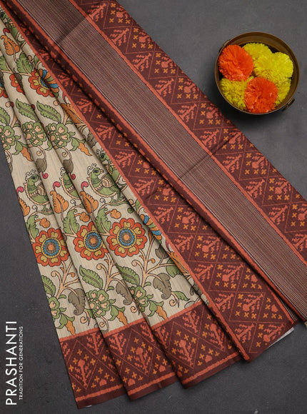 Semi tussar saree beige and coffee brown with allover kalamkari prints and patola printed border