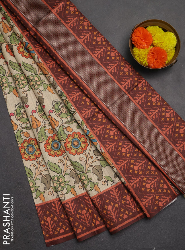 Semi tussar saree beige and coffee brown with allover kalamkari prints and patola printed border