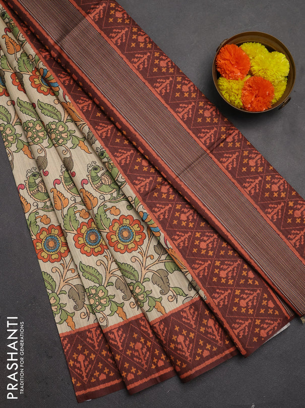Semi tussar saree beige and coffee brown with allover kalamkari prints and patola printed border
