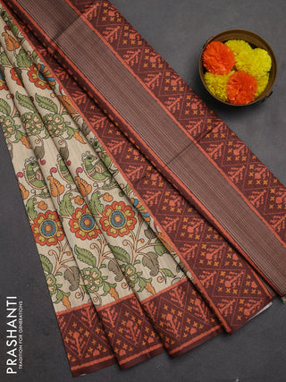Semi tussar saree beige and coffee brown with allover kalamkari prints and patola printed border