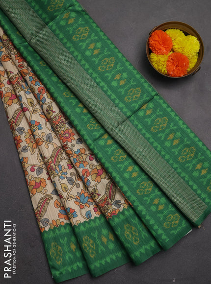 Semi tussar saree beige and green with allover kalamkari prints and patola printed border