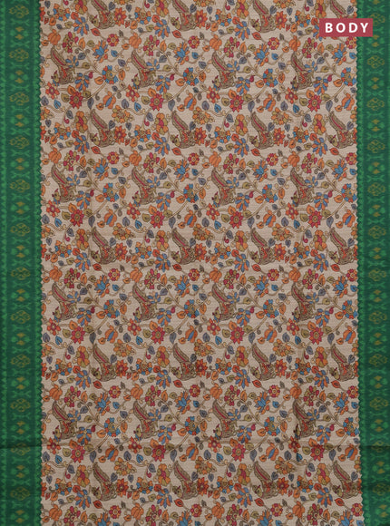 Semi tussar saree beige and green with allover kalamkari prints and patola printed border