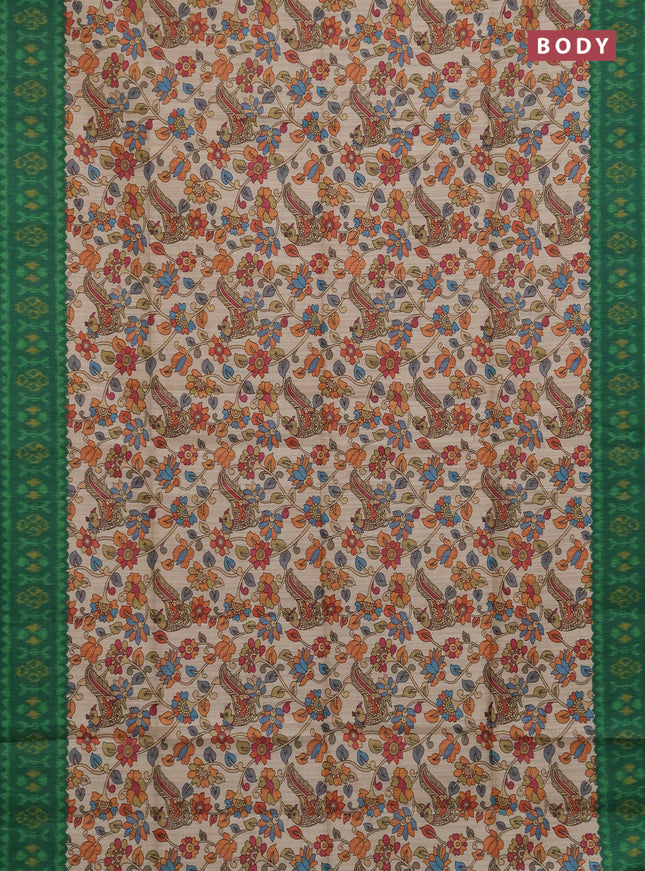 Semi tussar saree beige and green with allover kalamkari prints and patola printed border