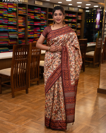 Semi tussar saree beige and coffee brown with allover kalamkari prints and patola printed border