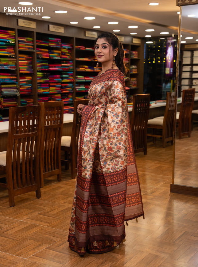 Semi tussar saree beige and coffee brown with allover kalamkari prints and patola printed border