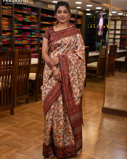 Semi tussar saree beige and coffee brown with allover kalamkari prints and patola printed border