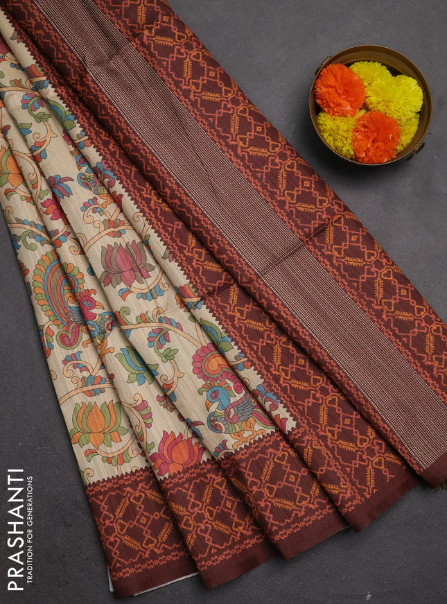 Semi tussar saree beige and coffee borwn with allover kalamkari prints and patola printed border