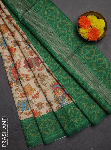 Semi tussar saree beige and green with allover kalamkari prints and patola printed border