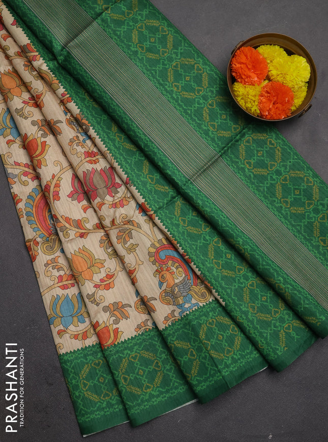 Semi tussar saree beige and green with allover kalamkari prints and patola printed border