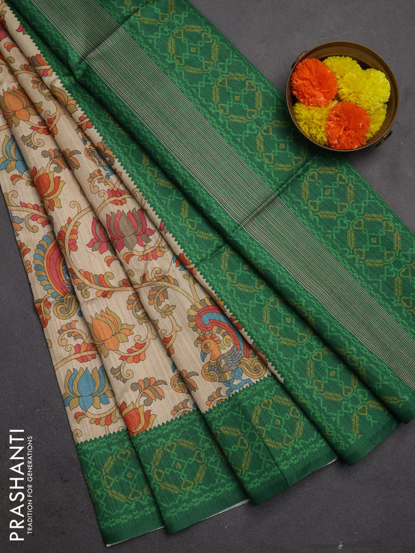 Semi tussar saree beige and green with allover kalamkari prints and patola printed border