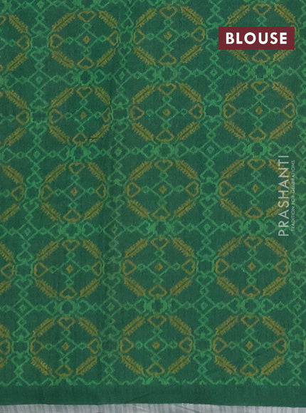 Semi tussar saree beige and green with allover kalamkari prints and patola printed border