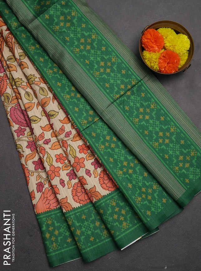 Semi tussar saree beige and green with allover kalamkari prints and patola printed border