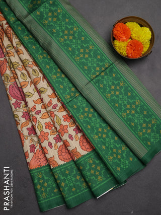 Semi tussar saree beige and green with allover kalamkari prints and patola printed border