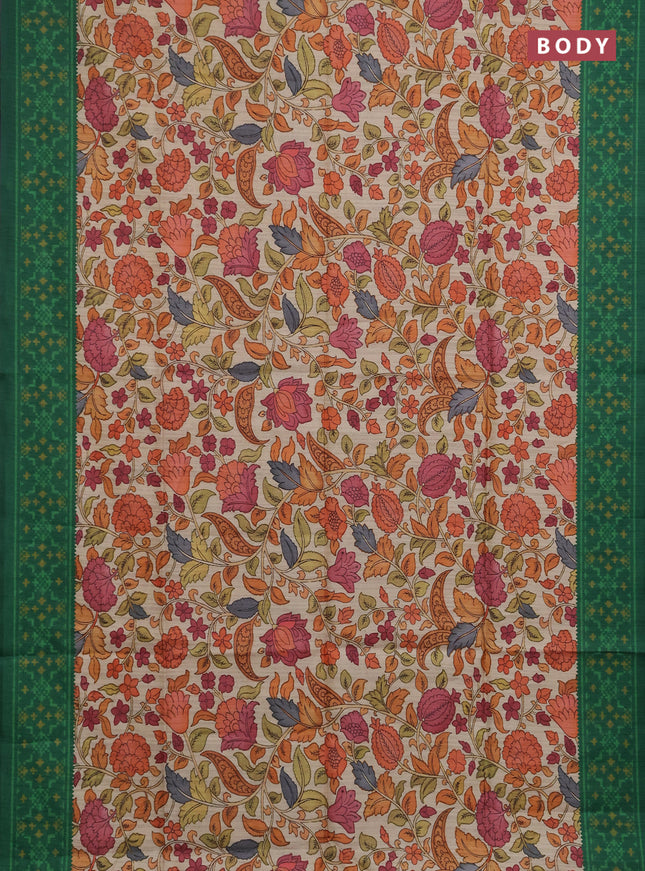 Semi tussar saree beige and green with allover kalamkari prints and patola printed border