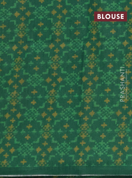 Semi tussar saree beige and green with allover kalamkari prints and patola printed border