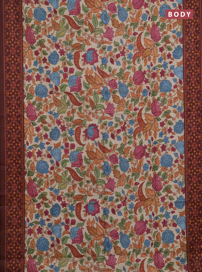 Semi tussar saree beige and coffee brown with allover kalamkari prints and patola printed border