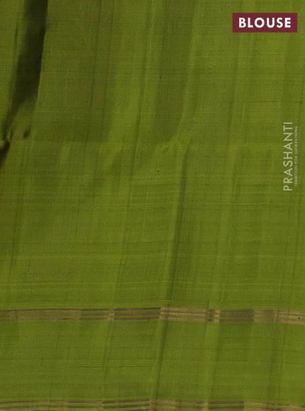 Pure soft silk saree navy blue and light green with allover zari woven buttas and rettapet zari woven border