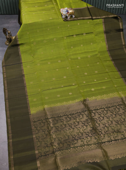 Pure soft silk saree light green and olive green with allover zari woven buttas and rettapet zari woven border